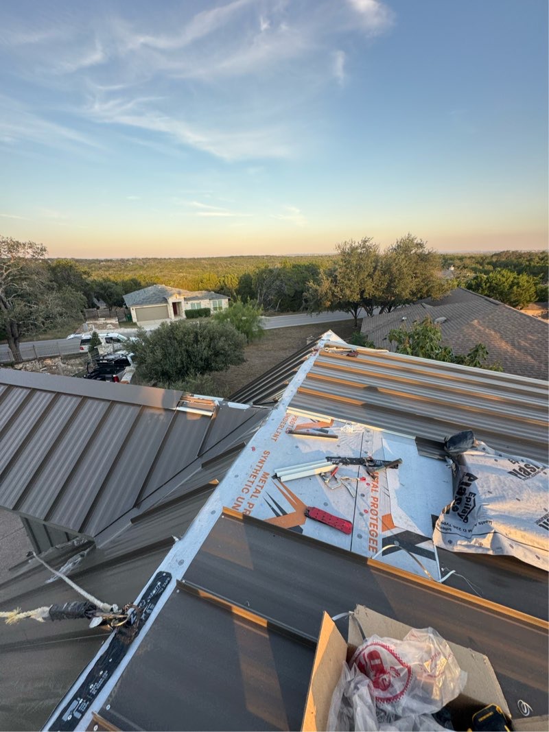 Roof repair work in progress with underlayment visible in Cedar Park, Texas - River Ranch Roofing And Construction